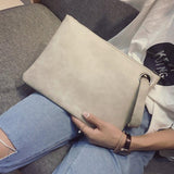 Fashion solid women's clutch bag leather